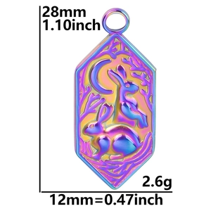 Detailed view of iridescent rabbit and moon pendant with 28mm dimension markings