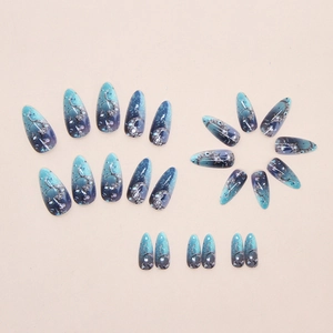 Deep blue galaxy press-on nails with silver glitter and starlight gradient design
