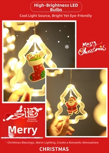 Detail of warm yellow LED Christmas hanging lights with Santa and tree decorations