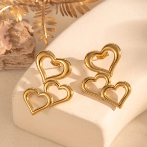 Elegant gold titanium steel earrings with three linked hollow heart charms for women
