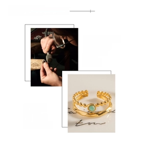 Detail of 18K gold plated double-layer ring with natural green stone and wavy texture