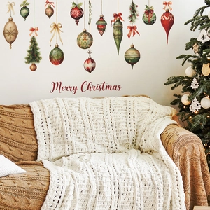 Chunky white and brown knit blankets on sofa with festive Christmas decor background