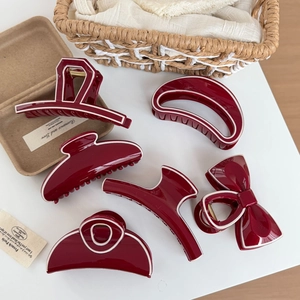 Elegant dark red acetate hair claw set with white borders in various stylish geometric shapes