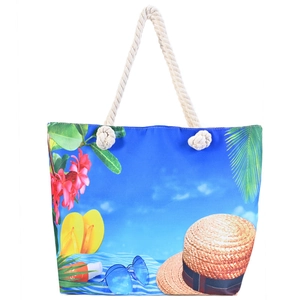 Détail du sac de plage en toile avec motifs océaniques et anse en corde tressée