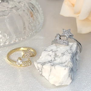 Elegant adjustable star rings in gold and silver finish with sparkling zircon accents