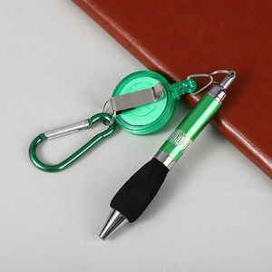 Retractable green ballpoint pen with metal carabiner and soft grip for outdoor use