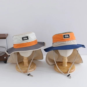 Close-up of kids hiking sun hats with neck flaps and adjustable chin straps