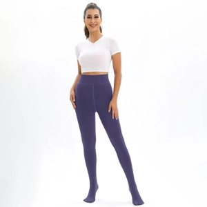 Detail view of high-waisted deep purple thermal leggings with fleece lining for women