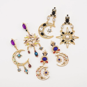Set di orecchini vintage bohémien dorati con motivi celesti di sole luna e stelle