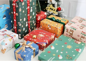 Detailed view of colorful Christmas gift boxes with festive ribbons and Merry Christmas patterns