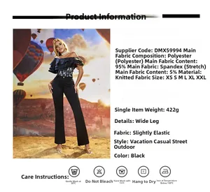 Détail d'un pantalon noir à jambe large avec haut élégant à volants et épaules dénudées