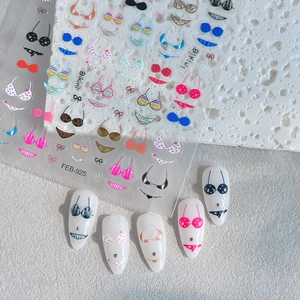 Detail of Bikini themed embossed nail art stickers with various swimsuit patterns FEB-925