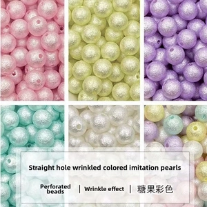Macro shot of wrinkled texture colorful ABS imitation pearl beads with straight holes