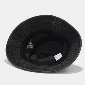 Unisex washed dark grey cotton bucket hat with interior sweatband and high texture detail
