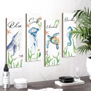 Four-piece nautical ocean wall art set featuring sea turtle, whale, and jellyfish designs