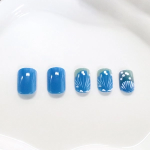 Blue shell pattern press-on nails with white polka dots and short square design