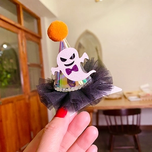 Detail of Halloween hair clip with laser cone hat, glitter ghost and black mesh