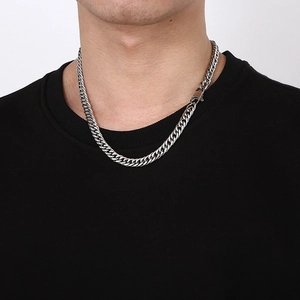 Silver cuban curb chain necklace for men in polished stainless steel on male model