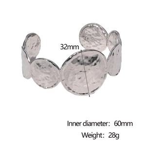 Detailed size chart of a silver stainless steel open bangle with hammered disc design