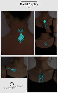 Luminous blue waterproof tattoo stickers featuring snakes and butterflies on skin
