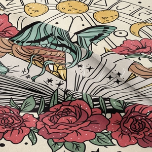 Detailed macro view of woven fabric texture with butterfly and moon phase prints