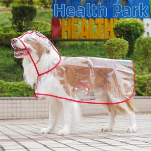 Close-up of waterproof transparent dog raincoat with red edging and hood for large dogs