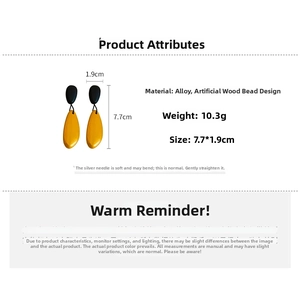 Detail view of water-drop wooden earrings with dimensions 7.7 by 1.9 cm and alloy material