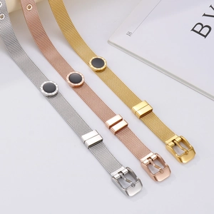 Detailed view of adjustable mesh chain bracelets with Roman numeral charms in gold, silver, and rose