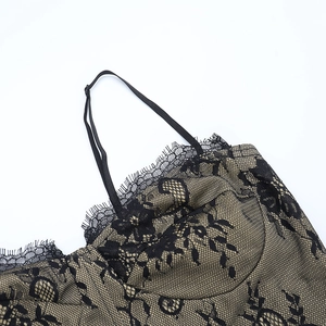 Close-up of black floral eyelash lace detail with adjustable spaghetti straps on mini dress