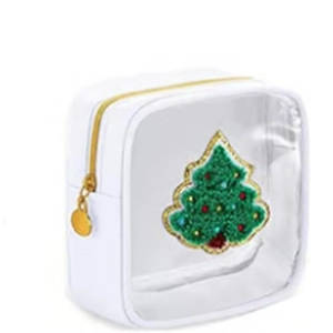 Detail of white transparent makeup bag with green chenille Christmas tree embroidery patch
