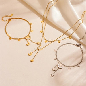 Gold and silver stainless steel layered necklaces and bracelets with moon star charms