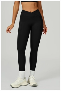 Legging de yoga noir taille haute avec ceinture croisée en V et poches latérales utiles