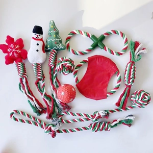 Detail shot of Christmas dog chew toy set featuring cotton ropes and rubber ball