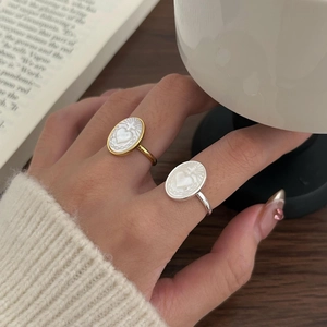 Elegant 925 sterling silver heart shell ring with vintage mother of pearl on model hand