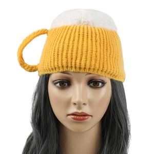 Detailed knit texture of the yellow beer mug hat with white foam top on a mannequin