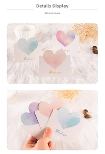 Detail showing gradient watercolor heart design with Thank You script on white card