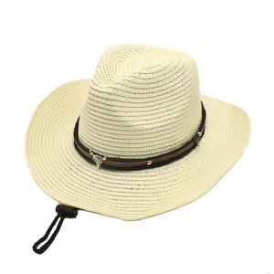 Beige straw cowboy hat with brown leather band, bull head ornament and adjustable cord