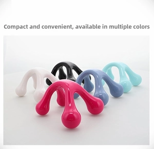 Detail of colorful manual 4-leg massage tools for neck and shoulder in multiple colors