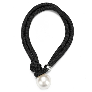 Double-layered black braided choker necklace with a large white pearl and silver bead
