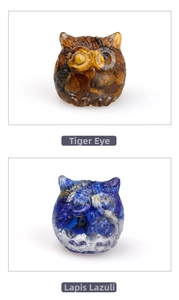 Detail view of tiger eye and lapis lazuli crystal owl figurines with fine texture