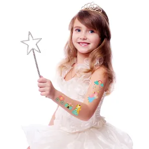 Tatouages dorés château de princesse avec arc-en-ciel et licornes pour enfants