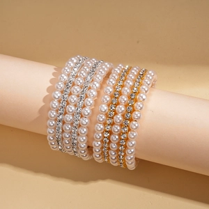 Vintage multi-layer faux pearl and rhinestone stretch bracelet set in gold and silver