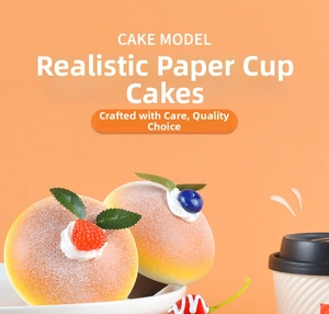 Close-up of artificial cupcake with lifelike berries and frosted texture for display