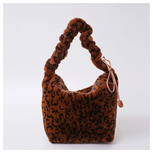 Furry leopard print crossbody bag with scrunchie handle and plush faux fur material