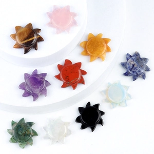 Carved natural stone sun shapes in amethyst, rose quartz, and tiger eye for home decor