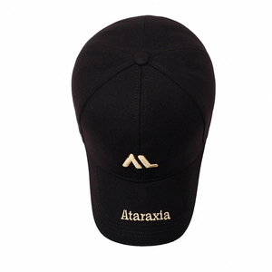 Black cotton baseball cap with gold Ataraxia embroidery and structured six-panel crown