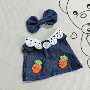 Detailed denim doll outfit with white lace collar, carrot embroidery and matching bow