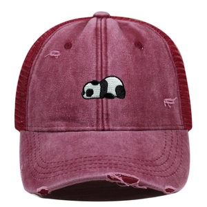 Vintage red washed cotton trucker hat with panda embroidery and distressed mesh design