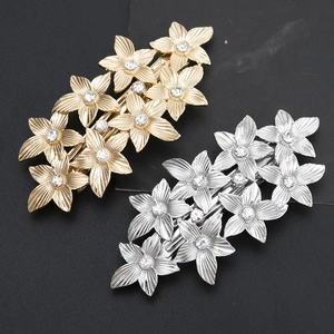 Luxurious metal flower hair clips with crystals in gold and silver finish set of two