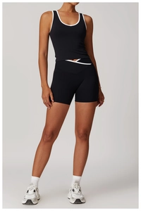 Black slim-fit sports vest and high-waist shorts set with white contrast piping details